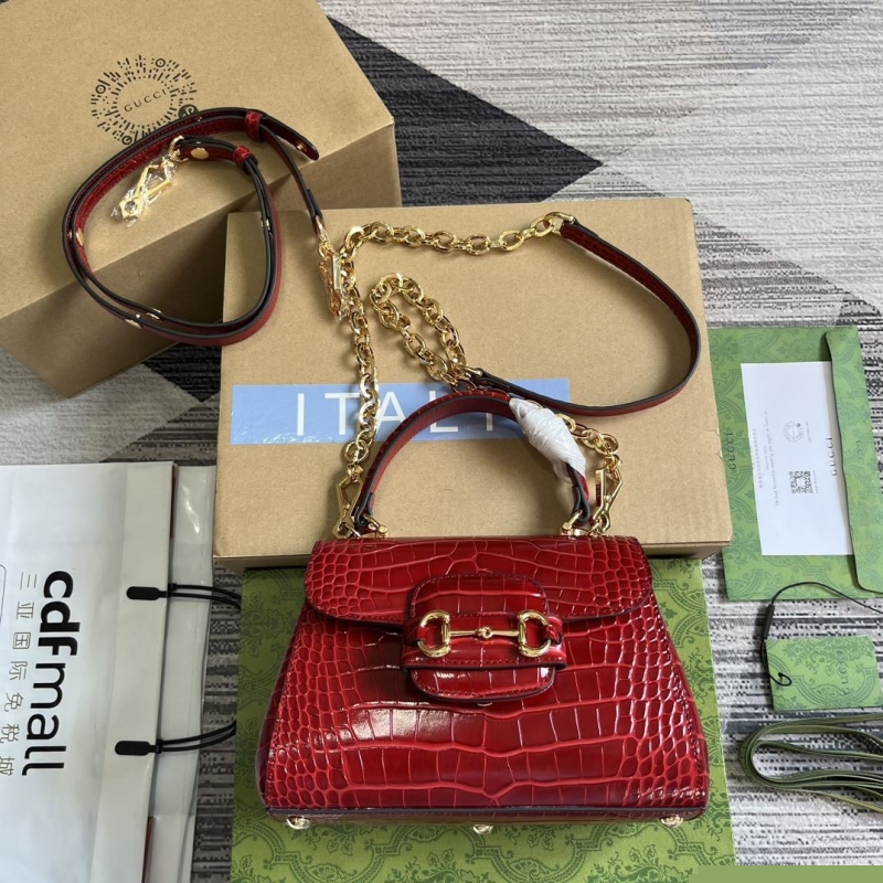 G*u*i top handle bags